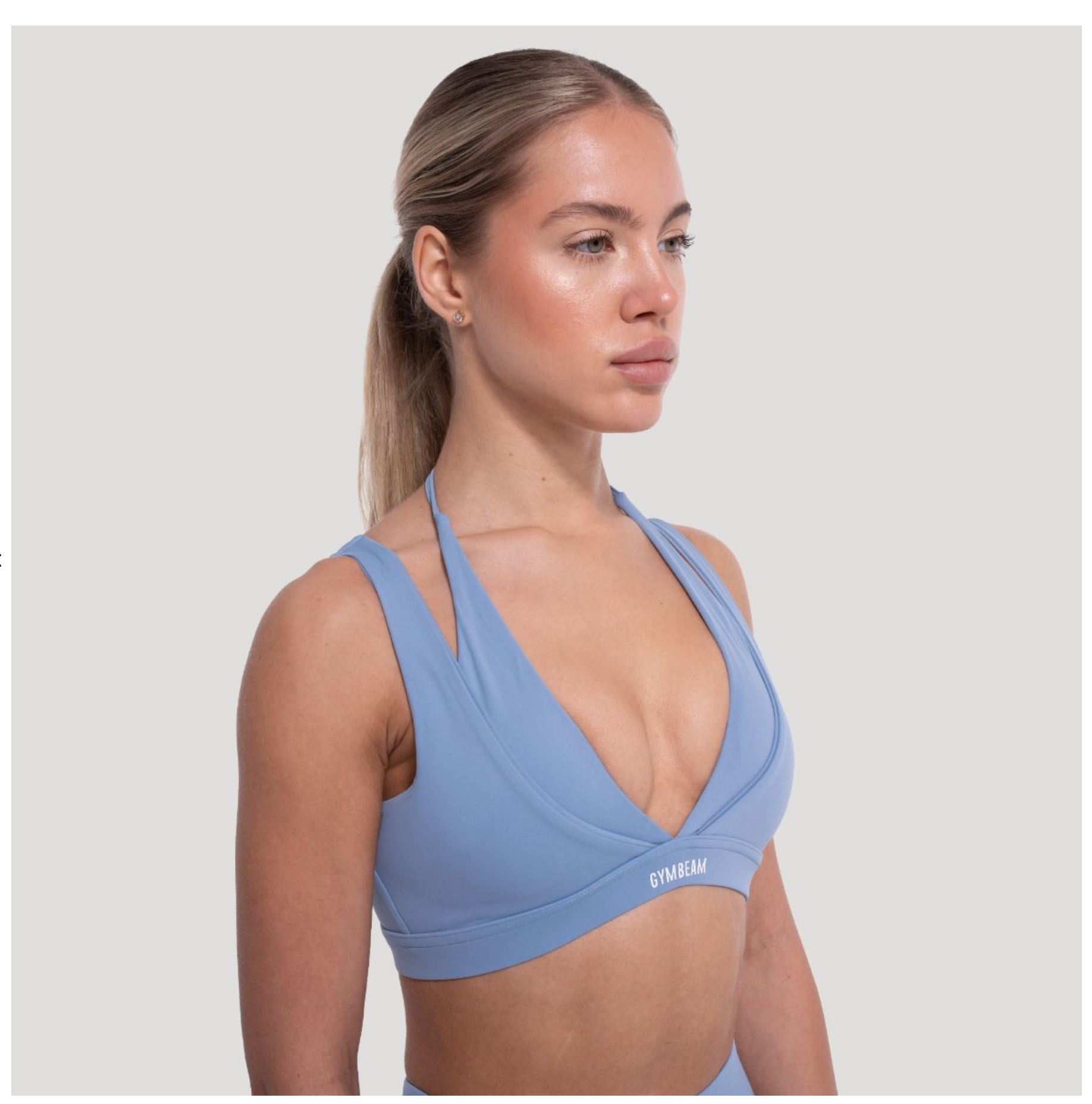 GymBeam Sport-BH FLOW Azurblau zweilagiges Design Fitness-BH mit Stützkraft & V-Ausschnitt Gr. M