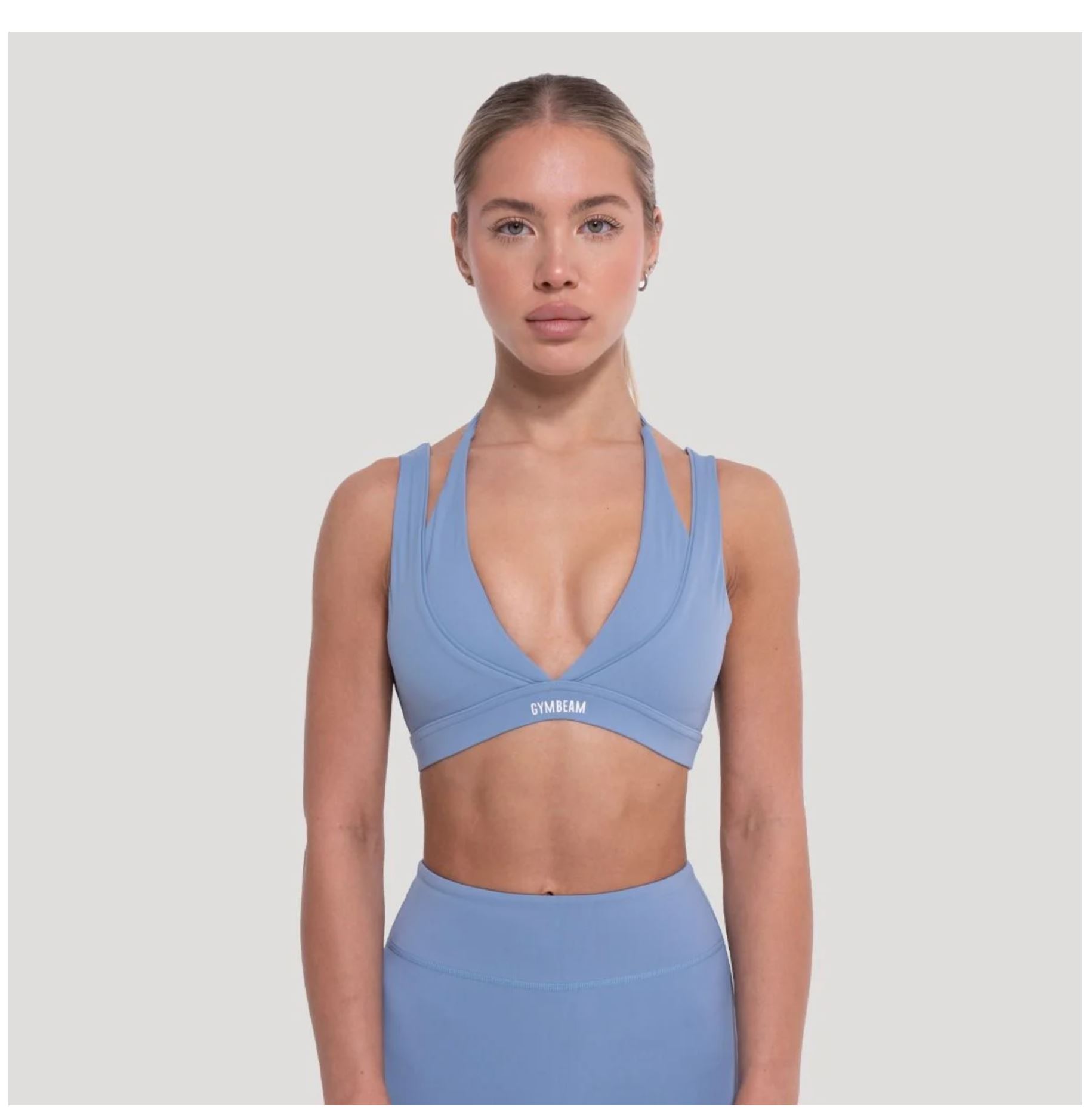 GymBeam Sport-BH FLOW Azurblau zweilagiges Design Fitness-BH mit Stützkraft & V-Ausschnitt Gr. M